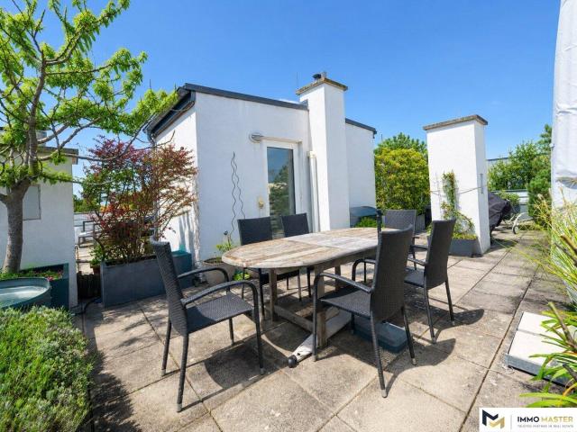 Großzügige Maisonette mit privater 48 m² Dachterrasse und Panoramablick