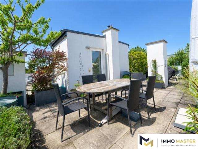 Großzügige Maisonette mit privater 48 m² Dachterrasse und Panoramablick