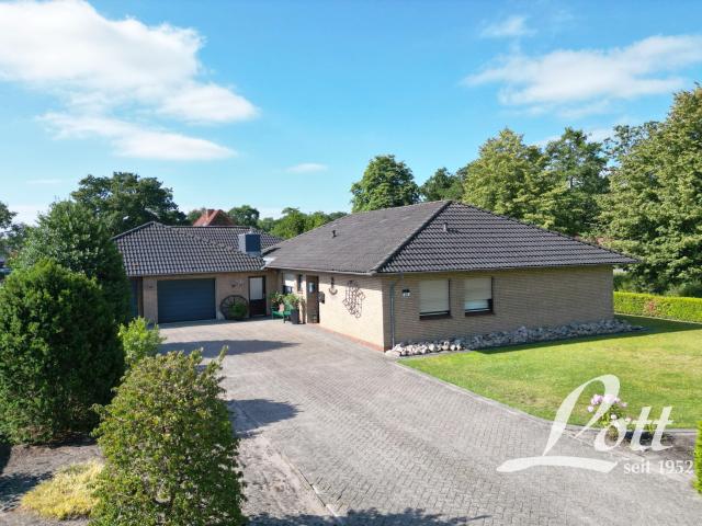 Großzügiger Bungalow mit ebenerdigem Raumprogramm in beliebter Kanallage von Augustfehn!