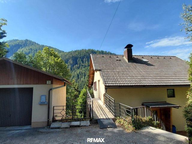 Großzügiges 6 Zimmer Haus mit Garten, Garage & Bergblick Ihr Renovierungsprojekt!