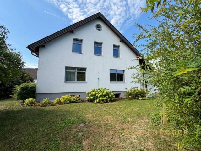 Großzügiges Einfamilienhaus mit besonderem Raumgefühl und schönem Garten