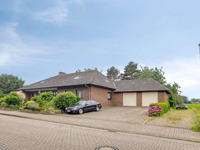 Großzügiges Einfamilienhaus in Toplage von Rees‑Millingen – Wohnen und Arbeiten unter einem Dach
