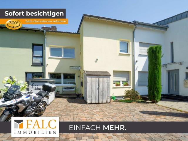 Großzügiges Familienhaus mit modernem Bad, idyllischem Garten und drei Stellplätzen