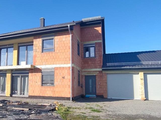 Großzügiges Mehrfamilienhaus mit Doppelgarage und Garten