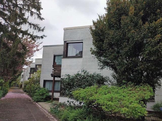 Großzügiges Reihenmittelhaus mit Einliegerwohnung und sonnigem Atriumgarten