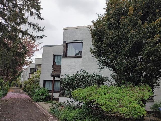 Großzügiges Reihenmittelhaus mit Einliegerwohnung und sonnigem Atriumgarten
