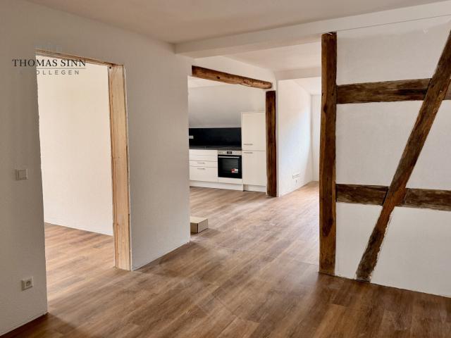 Großzügiges Wohnen auf zwei Ebenen – 5,5 Zimmer Maisonette Wohnung mit Dachterrasse & Fachwerk
