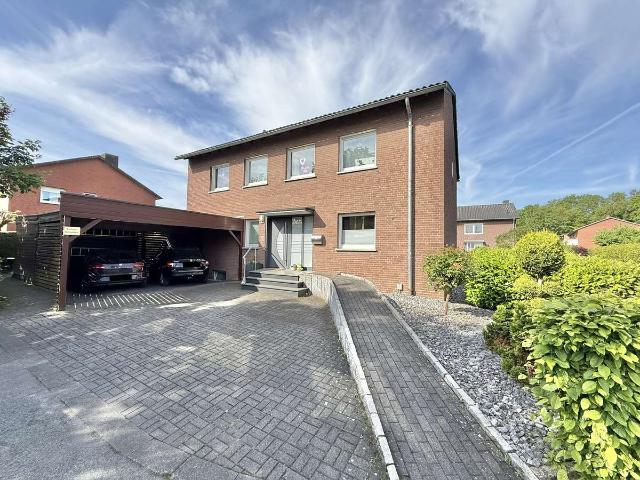 Großzügiges Zweifamilienhaus mit großem Garten und vielfältigen Nutzungsmöglichkeiten in Vellern