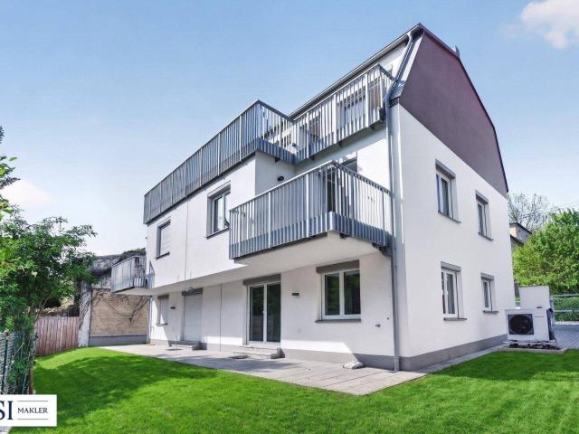 Großzügigkeit, die begeistert – Doppelhaushälfte mit Garten
