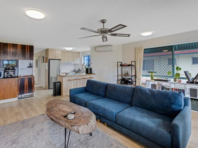 Grab Your Paddle Beachside Living Awaits!