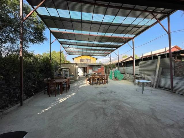 Gran oportunidad de casa con 2 galpones 1731 | dormitorios por 145000. 00 en Puente Alto