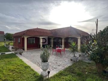 GRAN PARCELA CON BONITO CHALET Y NAVE INDUSTRIAL