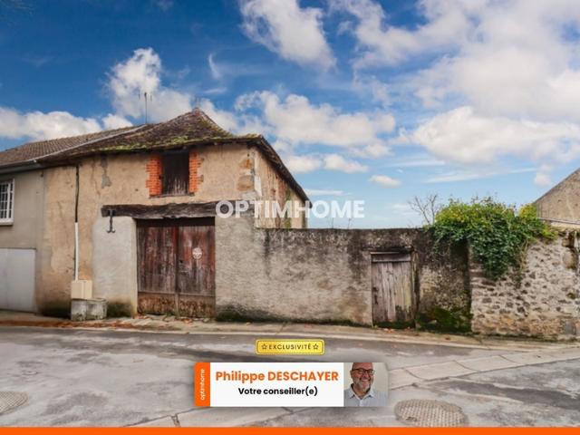 Grange de 110 m² environ sur 2 Niveaux sur parcelle de Terrain 280 m² Centre Bourg Historique MAGNAC LAVAL 87