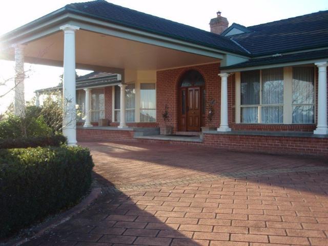 Grand 4 bedroom home + 1 bedroom self contained granny flat on approx 1 acre with pool