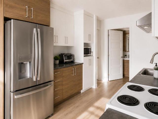 Grand 4½ lumineux avec plancher chauffant et climatiseur