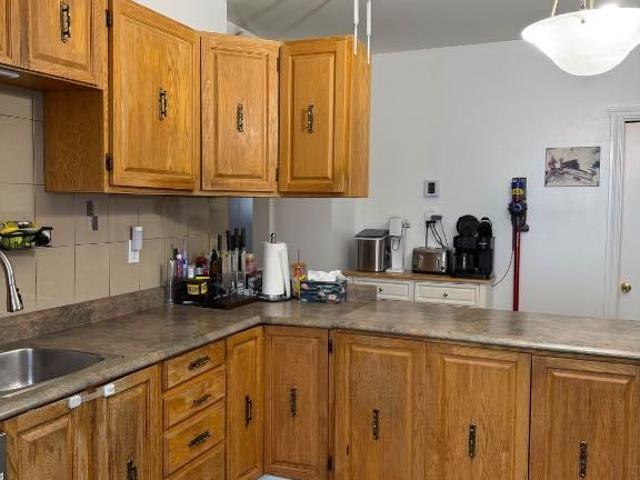 Grand 6 1/2 Bas de maison