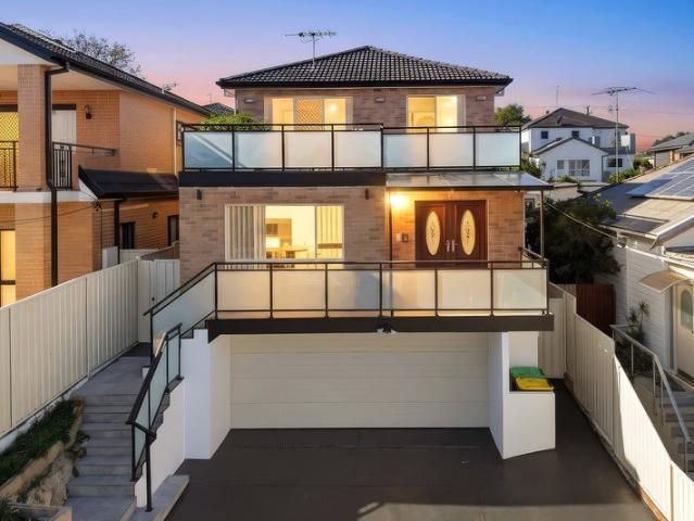 Grand Tri Level Family Residence with Expansive Living & Panoramic District Views