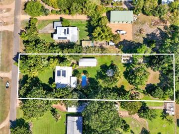 Grand Two Storey Private Oasis Offering Luxury Acreage Living, Resort Style Pool & Comfortable Family Home