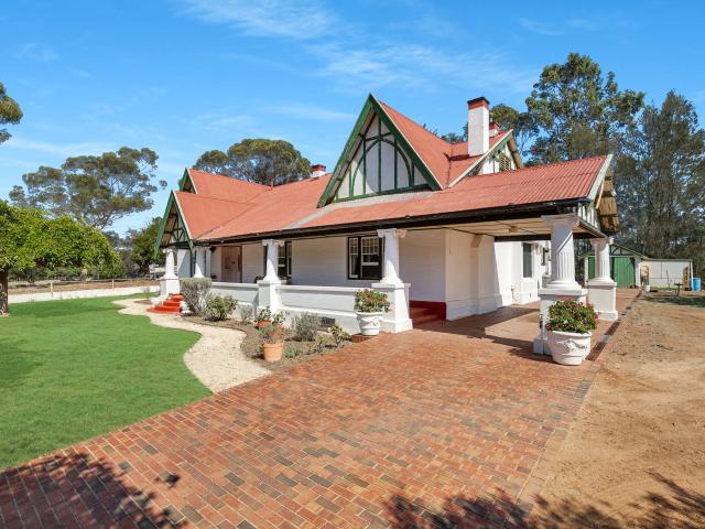 Grand Tudor Style Residence with Rich History!