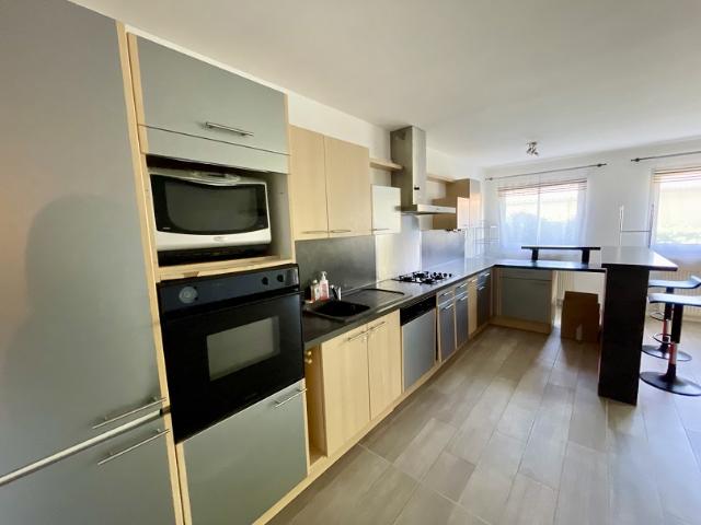 Grand appartement T3 avec jardin, terrasse et garage