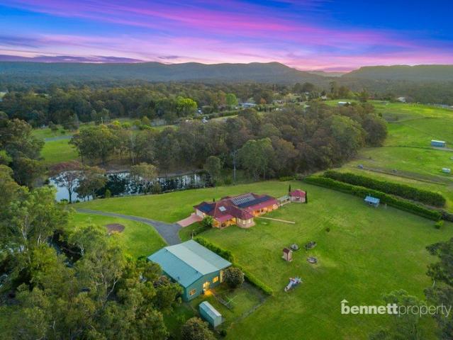 GRAND COUNTRY HOMESTEAD ON PARK LIKE ACRES