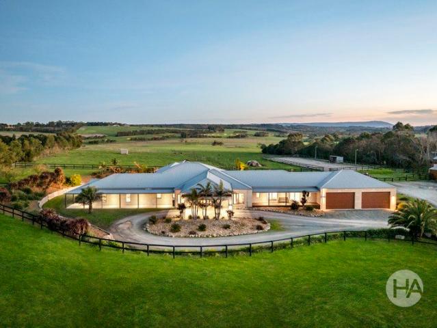 Grand Equine Estate with Dual Living on 10.5 Acres