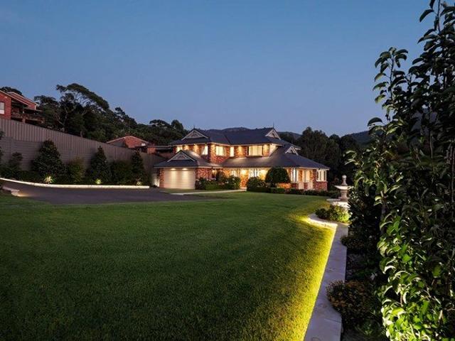 Grand Family Estate with Stunning Views & Landscaped Level Grounds
