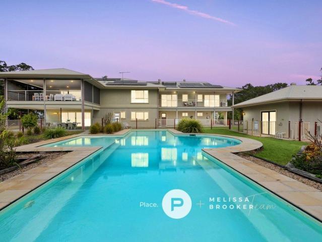 Grand family home with swimming pool, sheds and ample parking