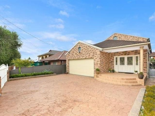 Grand Family Living in a Blue Ribbon Campsie Address