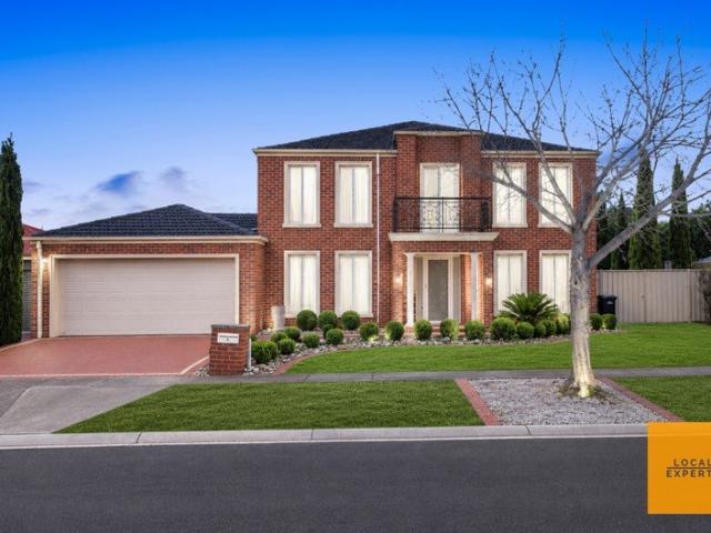 Grand Family Living with Exceptional Space, Side Access and Proximity to all Major Amenities!