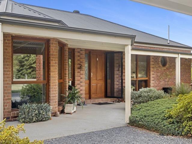 Grand Homestead Living on 6.2 Acres Character, Privacy and Proximity