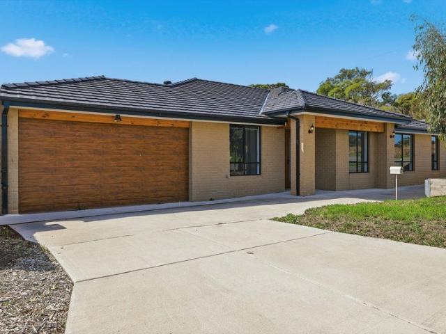 Grand in Design Quality Single Level Brick Home