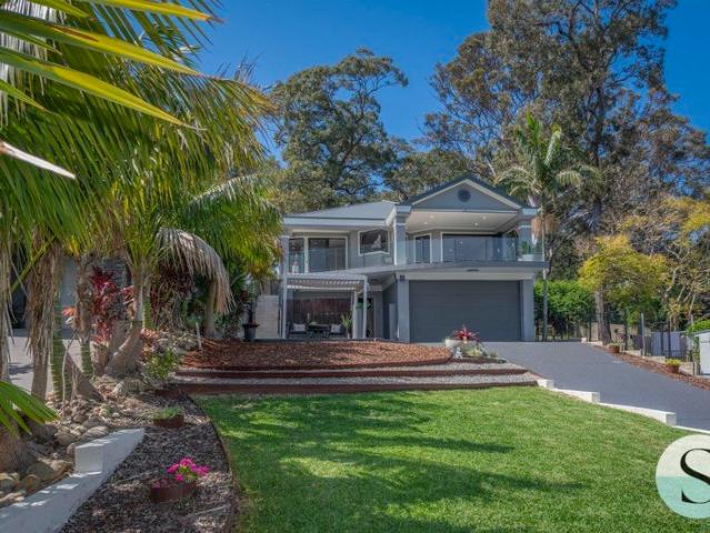 Grand Lakeside Living, Beautiful Water Views, One Home off Waterfront, but Less than Half the Price! One Level Where Everyone Can Come Together!