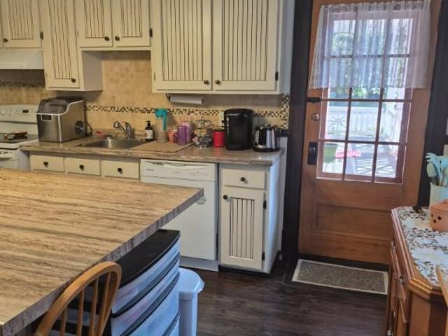 Grand Logement 4 1/2 rez de chausse immeuble centenaire,centre ville st jerome