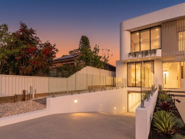 Grand Luxury Residence, Flowing Over Three Spacious Levels of Living With Seven Car Basement, Prime Location