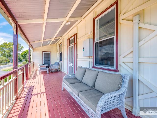 Grand Queenslander Charm with Dual Living, Pool & 3 Bay Shed!
