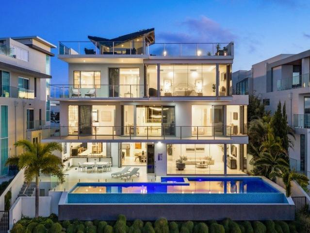 Grand Waterfront Living with Panoramic Broadwater Views