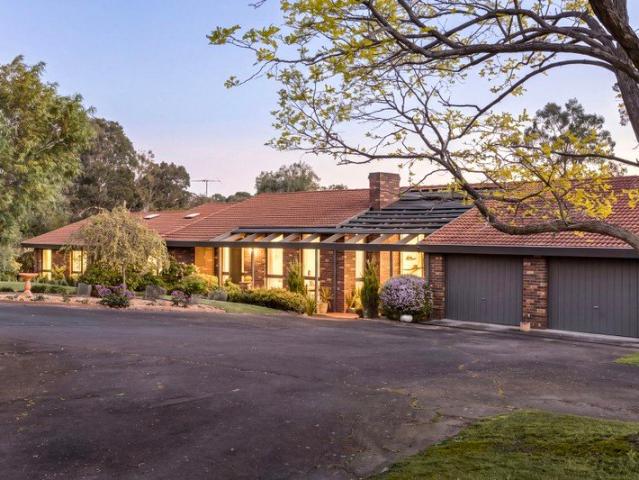 Grand Scale Family Living on a Gorgeous Garden Acre