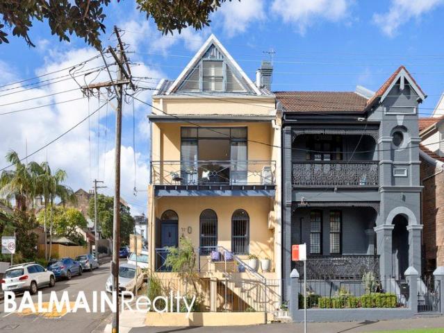 Grand Scale Living Across Three Levels on a Coveted Corner Block Position with Off Street Parking