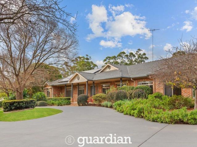 Grand single level entertainer in an exclusive setting