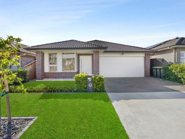 Grand size four bedroom family home in central locale