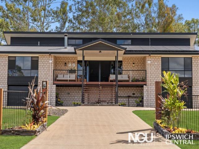 GRAND STREET PRESENCE WITH MOUNTAIN VIEWS, HUGE SHED & 18KW SOLAR!