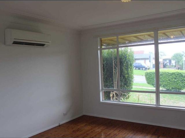 Greystanes Special Large corner block with side access to garage and extra parking