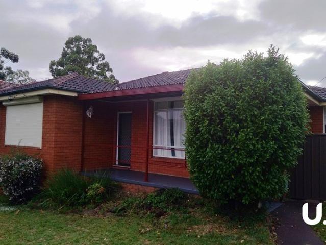 Greystanes Special Large corner block with side access to garage and extra parking