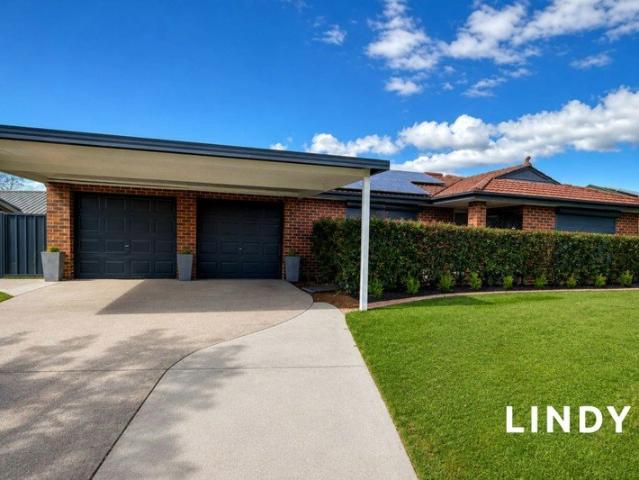 GREAT VALUE. BEAUTIFUL YARD. AMPLE PARKING