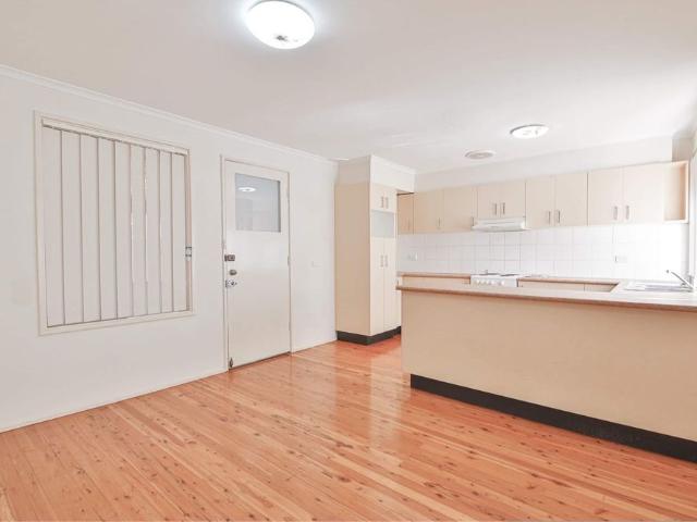 Great Location with a yard for the kids!