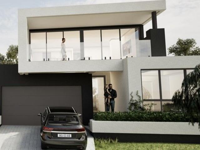 Green title street frontage land with city views in highly desirable Woodlands