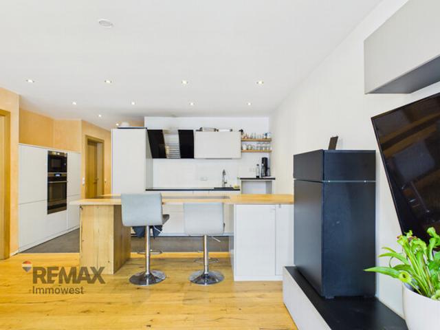 Grenznah wohnen: Moderne Terrassenwohnung für Pendler und Genießer