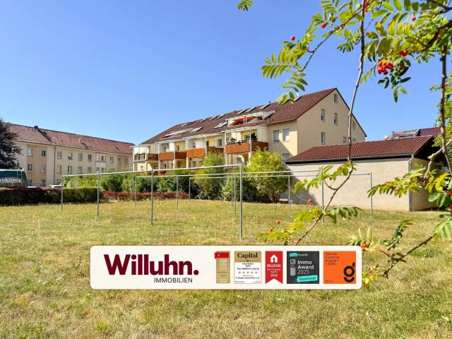 Grün und zentral Wohnen auf 2 Ebenen | Einbauküche | Kamin | Loggia | Pkw Stellplatz