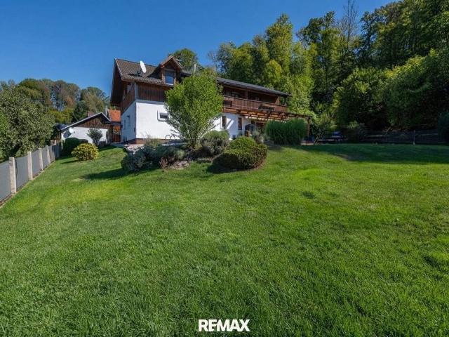 GRÜNDBERGSIEDLUNG | Einfamilienhaus mit traumhaftem Garten, Pool, Carport & Garage in sonniger Grünlage!